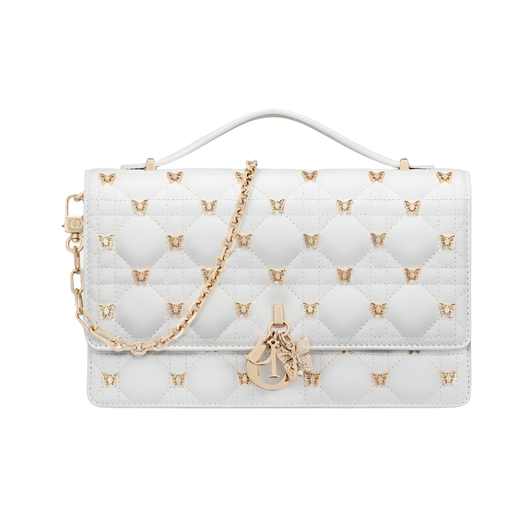 Mini sac My Diôr
d'agneau Cannage blanc et studs dorés Dior Cabinet de Curiosités