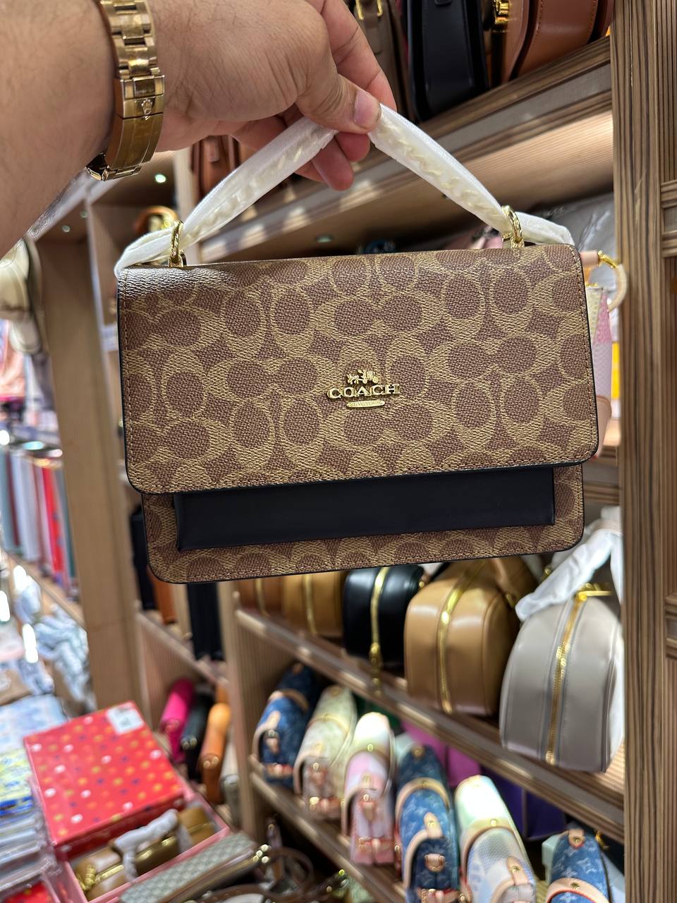 Co@ch Mini sac à porté-croisé Klare en toile signature