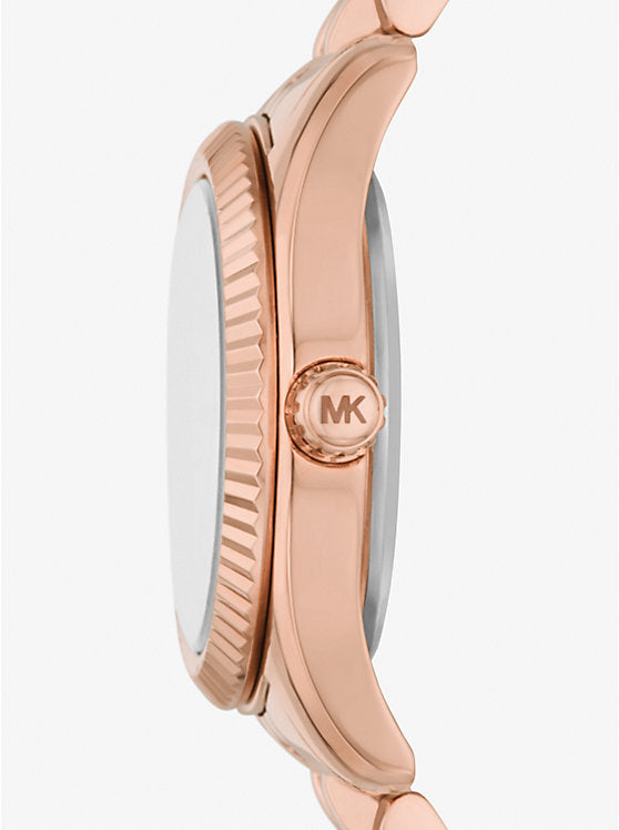 Michael Kors
Petite montre Lexington ton or rose avec pierres pavées