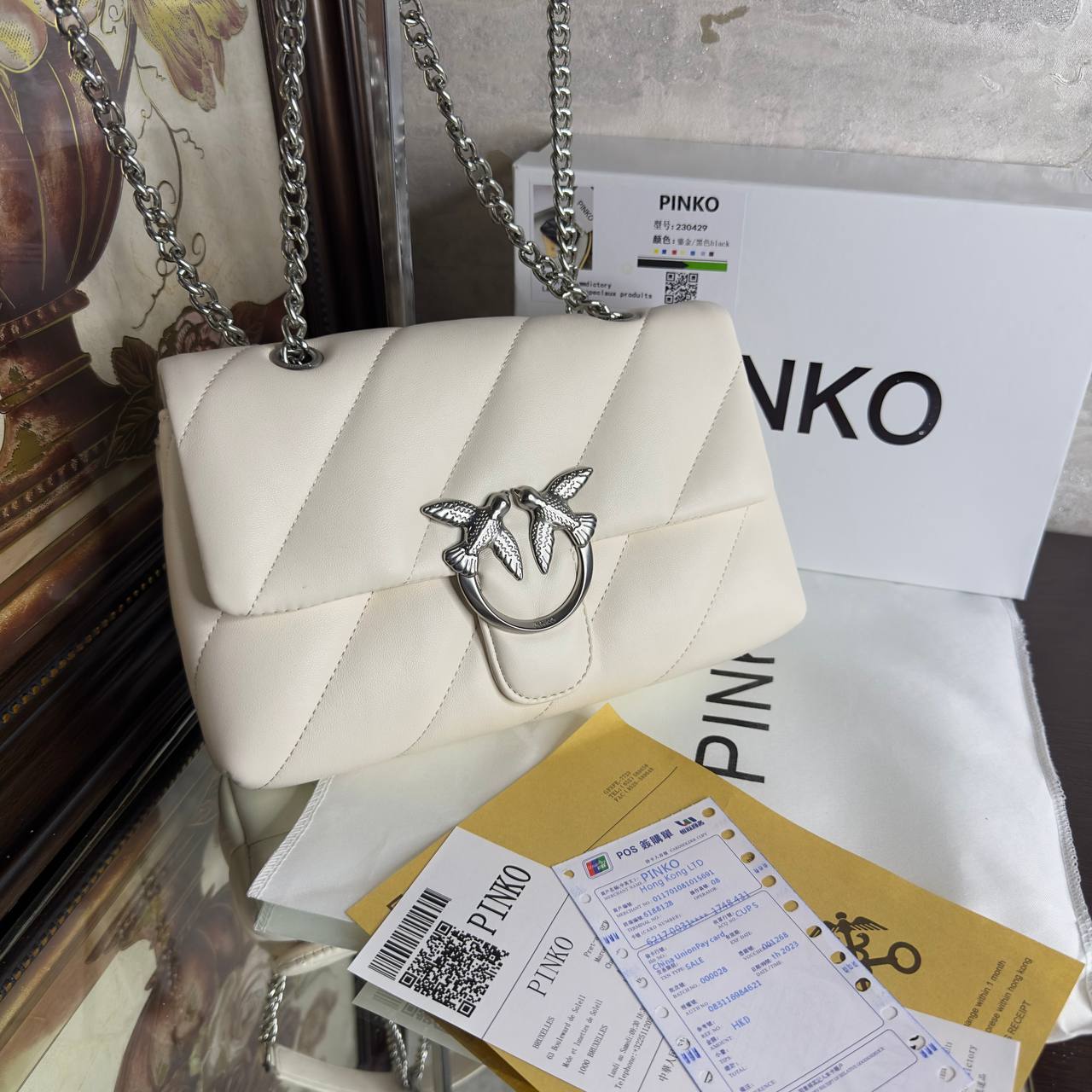 PÏNKÔ 
sac porté épaule Love à design matelassé