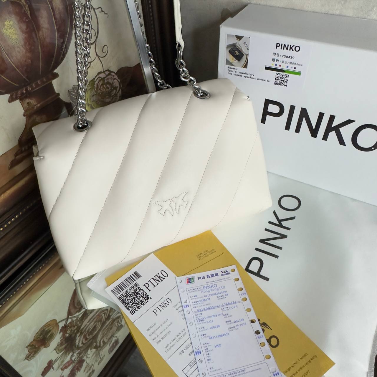 PÏNKÔ 
sac porté épaule Love à design matelassé