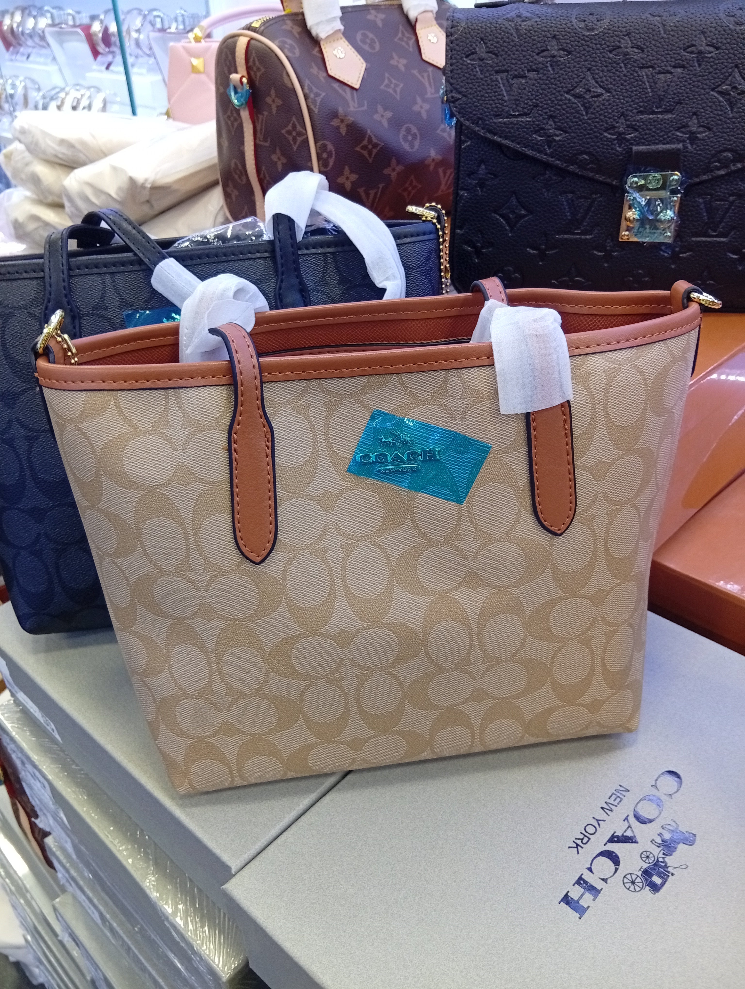 Co@ch Petit sac fourre-tout de ville en toile signature