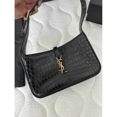SAINT LAURENT
Le 5 à 7 croc-effect leather shoulder bag
