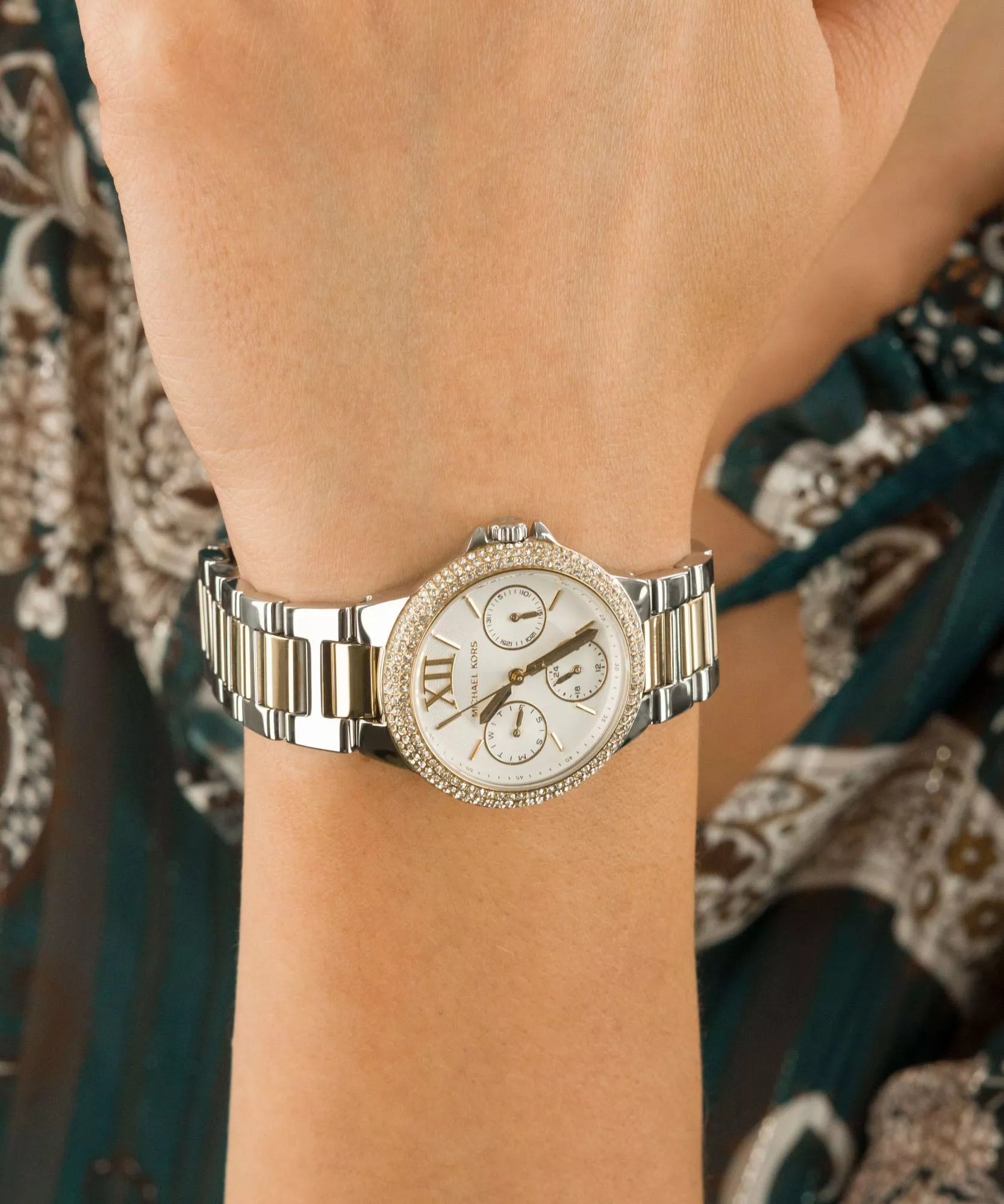 Mich@el Kors
Petite montre Camille bicolore avec pierres pavées