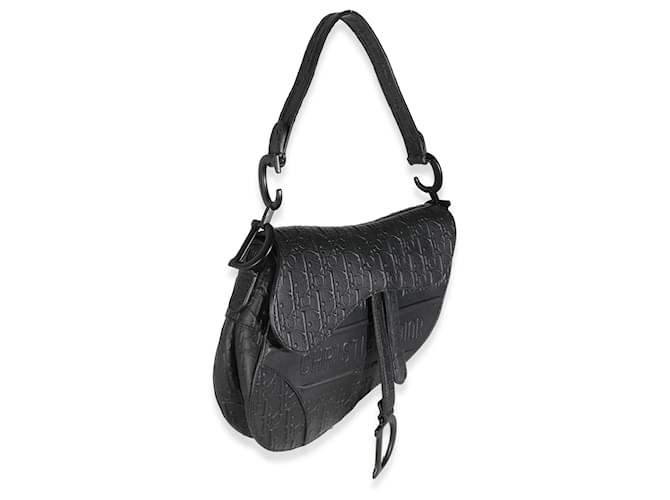 Christian Di*r Sac à dos moyen de veau noir oblique embossé