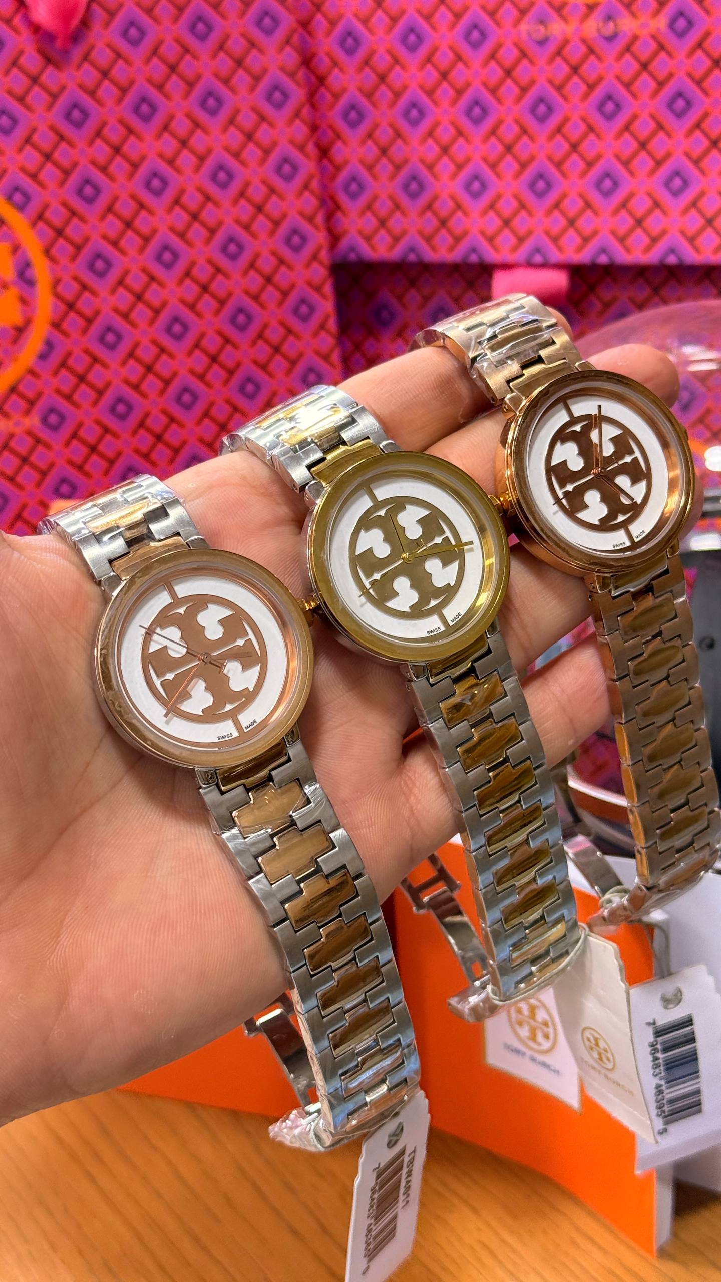 Montre Tory Burch Reva avec boîtier de 28 mm et bracelet bicolore