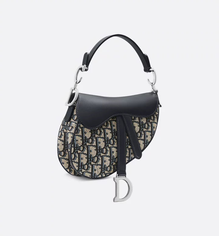 Sac Saddle Mini à bandoulière
Toile jacquard Diôr Oblique et cuir de veau lisse bleus