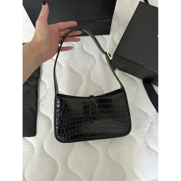 SAINT LAURENT
Le 5 à 7 croc-effect leather shoulder bag