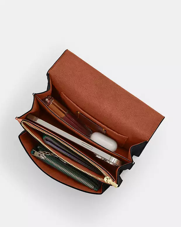 Co@ch Mini sac à porté-croisé Klare en toile signature