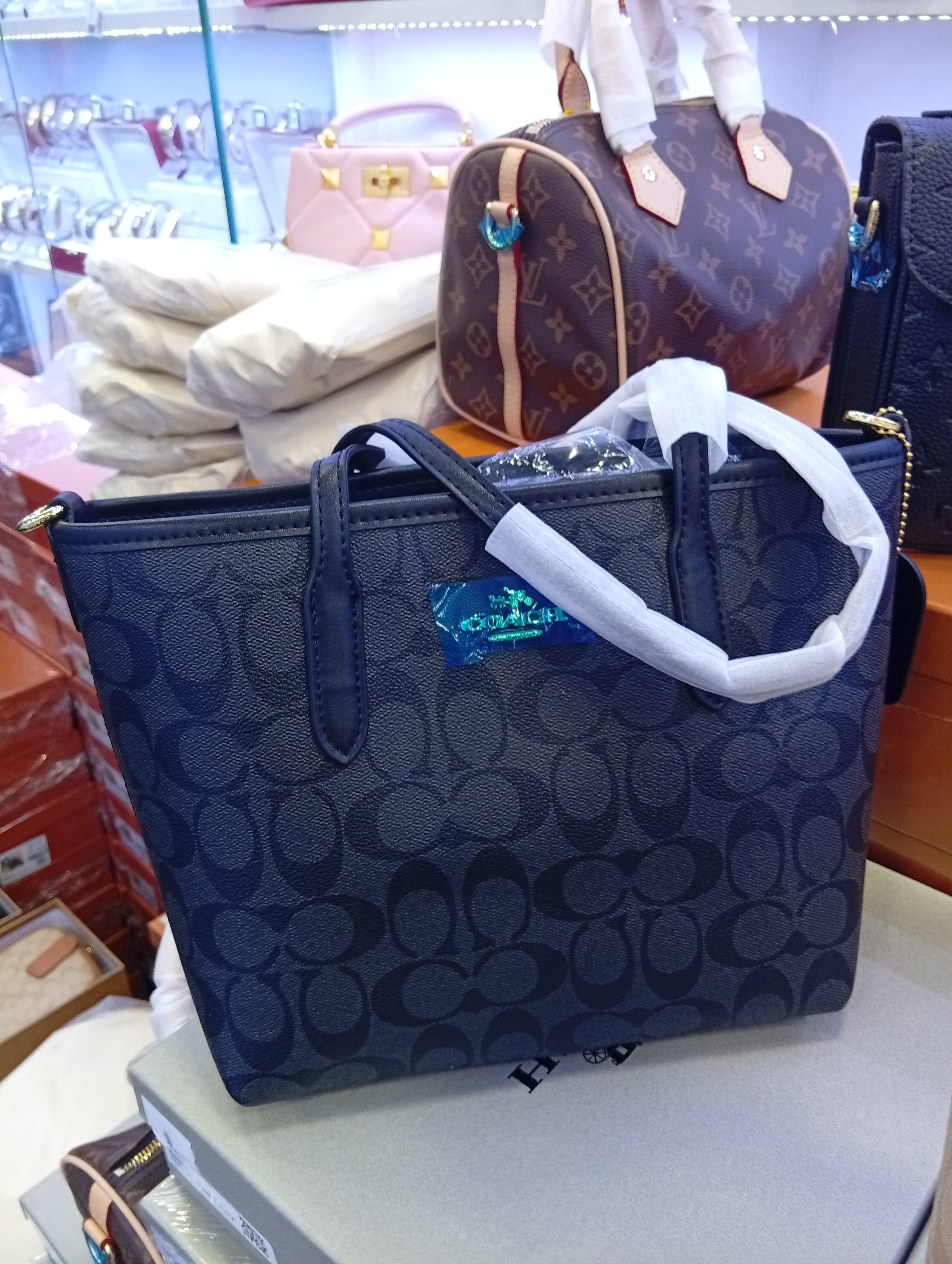 Co@ch Petit sac fourre-tout de ville en toile signature