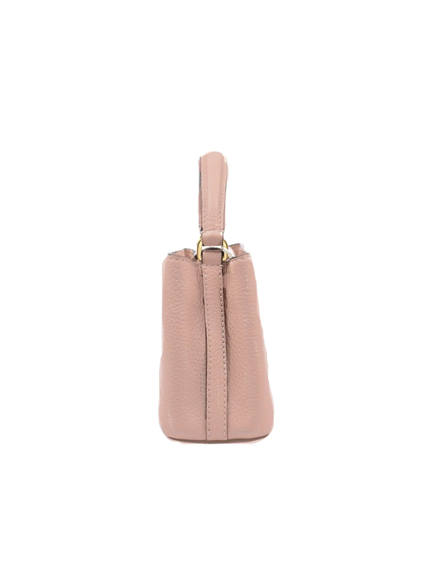 Sac à main micro-sac Britten de Torÿ Bûrch, couleur reine-des-prés clair