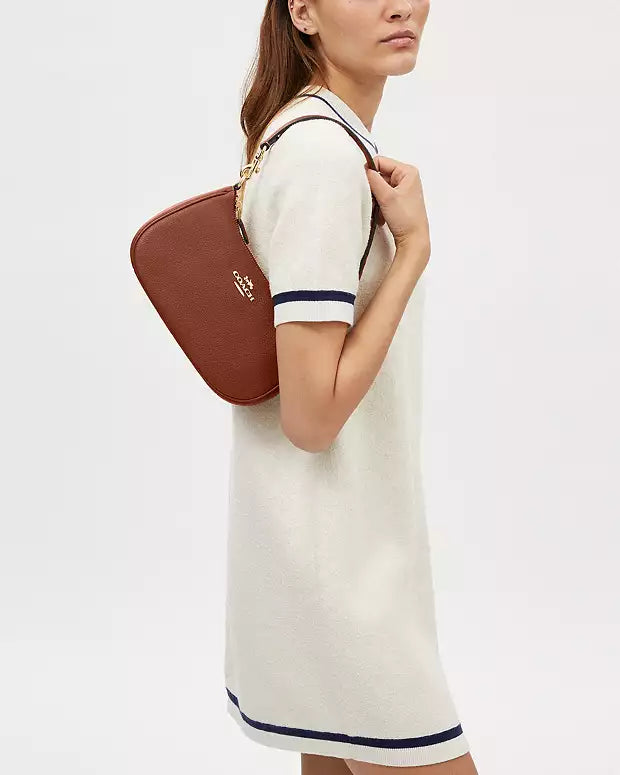 Co@ch Sac bandoulière Teri avec rivets