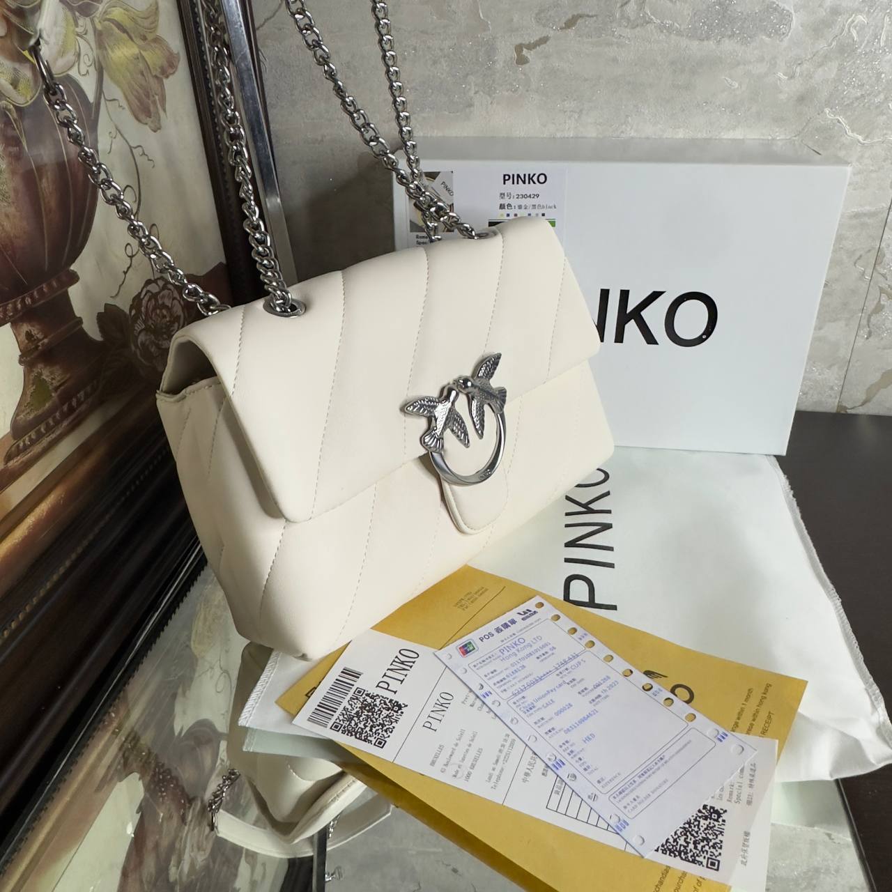PÏNKÔ 
sac porté épaule Love à design matelassé