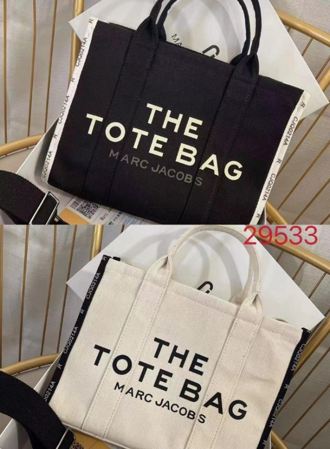 M@rc Jacôbs 
The Medium Tote Bag Jacquard